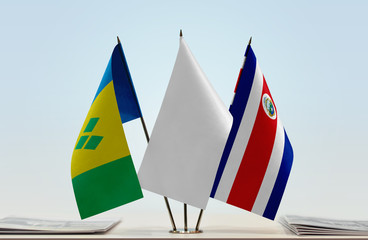 Flags of Saint Vincent and the Grenadines and Costa Rica with a white flag in the middle