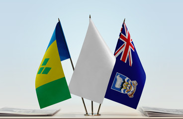Flags of Saint Vincent and the Grenadines and Falkland Islands with a white flag in the middle