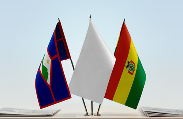 Flags of Sint Eustatius and Bolivia with a white flag in the middle