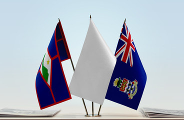 Flags of Sint Eustatius and Cayman Islands with a white flag in the middle