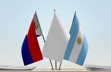 Flags of Sint Maarten and Argentina with a white flag in the middle