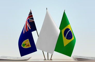Flags of Turks and Caicos Islands and Brazil with a white flag in the middle