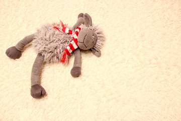 Children's toy. The plush lamb.