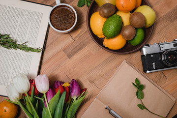 tulips notebook wooden table