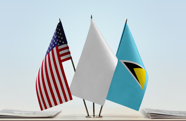 Flags of USA and Saint Lucia with a white flag in the middle