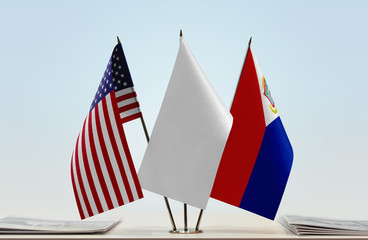 Flags of USA and Sint Maarten with a white flag in the middle