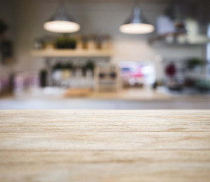 Table Top Wooden Counter Blur Kitchen Pantry With Shelf And Lighting Background