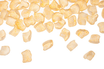 Spicy chips flakes fly on white background, isolated, pattern, top view.