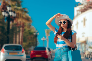 Summer Girl with Shopping Bag and Smartphone Looking for Taxi