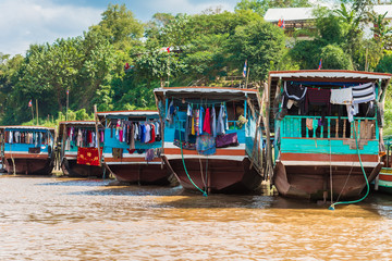 Boats near the bank of the river Nam Khan in Luang Prabang, Laos. Copy space for text.