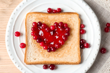 Delicious toast with sweet jam on plate