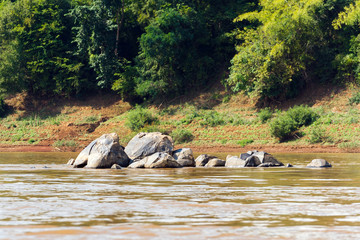 View of the landscape of the river Nam Khan, Luang Prabang, Laos. Copy space for text