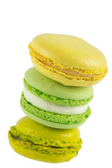 Apple biscuit macaron tower and lemon, on white background