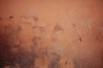 Surface of a grunge red wall.