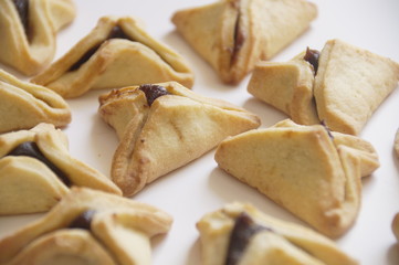 traditional purim triangular pastry stuffed with figs