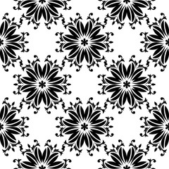 Fototapeta na wymiar Black flowers on white background. Ornamental seamless pattern