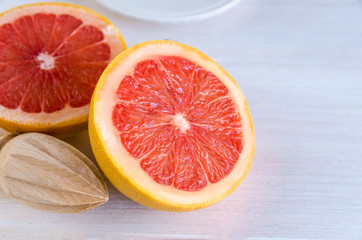 Fototapeta na wymiar Close up of grapefruit fruit often include in weight loss programs .Healthy fruit background.