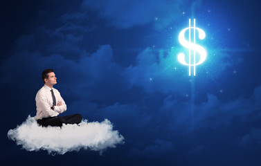 Man sitting on a cloud dreaming of money