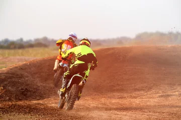 Fotobehang Behind the Moto Crossover Extreme dusty field © EmmaStock