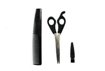 scissors for hair cutting, comb and brush isolated on white background