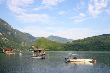 floating houses and boats on Drina river Serbia