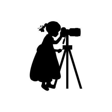 Silhouette girl photographer looking camera