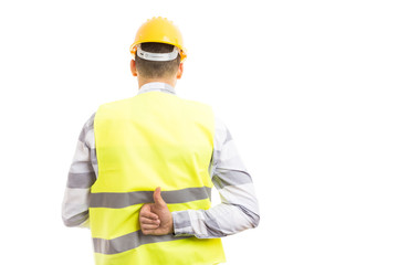 Constructor or builder showing like thumbs-up gesture behind back.