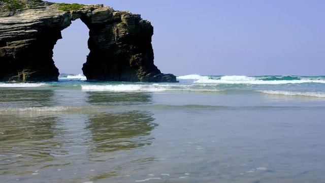 Beach of the Cathedrals. Natural arch at Las Catedrales beach known as Praia de Augas Santas (Beach of the Holy Waters) in Galicia, Spain