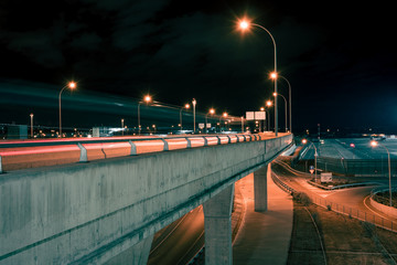 Motion blurred car lights on a highway at night