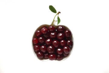 Beautiful and fresh cherry in a bowl on a white background. Isolated