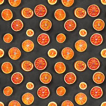 Seamless pattern with red bloody oranges on black