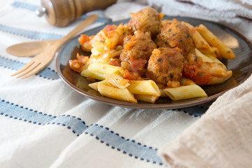 tasty penne with Meat ball and tomato sauce