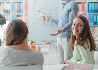 Researcher giving a lecture to the students
