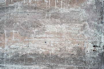 Texture of a white, shabby concrete wall
