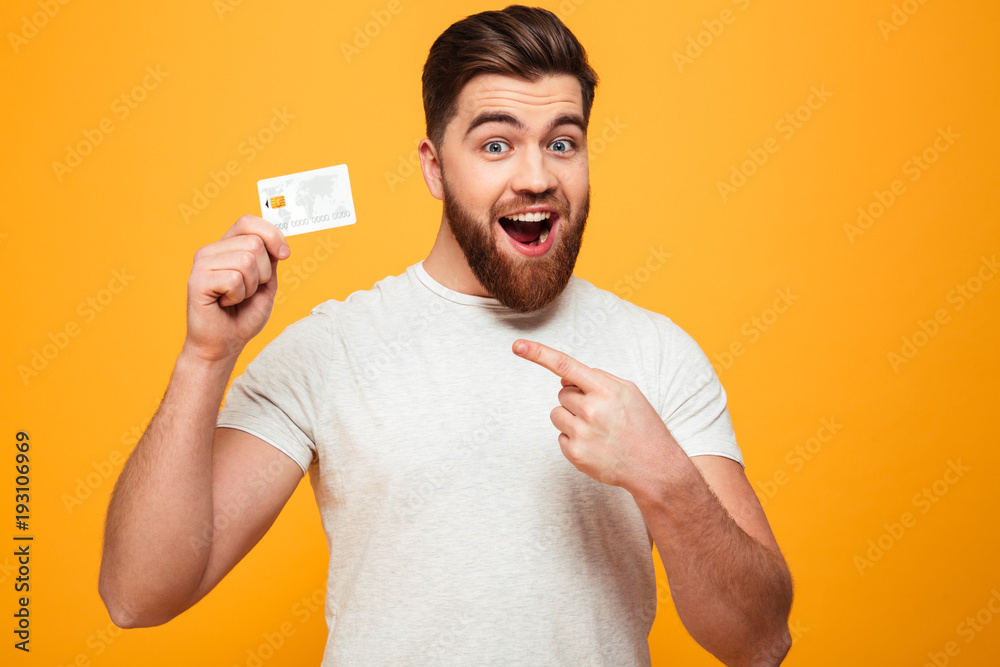 Poster portrait of a confident bearded man pointing finger