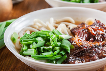 Japanese Udon noodles with beef, green onion and soup