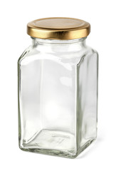 Empty glass jar with a cap isolated on white background with clipping path.