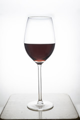 glass of wine on white