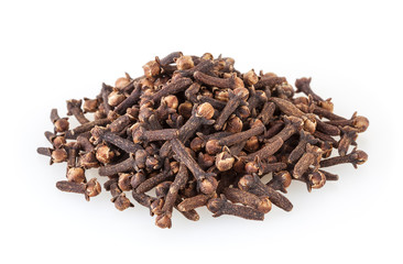Heap of dried cloves isolated on white background