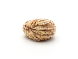 Peeled European chestnut one Spanish edible isolated on white background raw fresh brown nut.