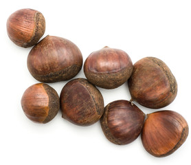Fototapeta premium European chestnuts Spanish edible isolated on white background raw fresh brown nuts top view.