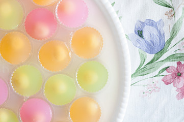 Fruit Shaped Mung Beans in Jelly close up in white foam dish, Wun Look Choup Thai sweets