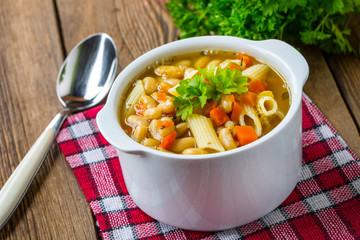 Bean soup with penne pasta.
