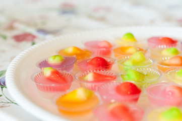 Fruit Shaped Mung Beans in Jelly close up in white foam dish, Wun Look Choup Thai sweets