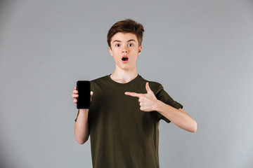 Portrait of a joyful male teenager wearing t-shirt