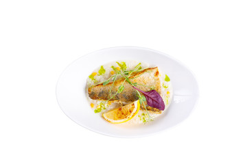 Appetizing second course of fish. Fried carp. on a white background.