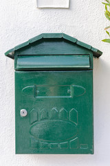 green mailbox on the wall
