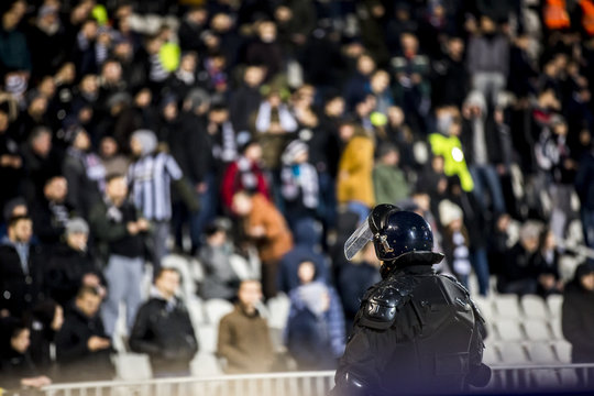 Special police unit at the stadium event secure a safe match against the hooligans