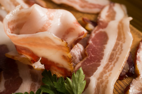 Raw smoked streaky sliced bacon