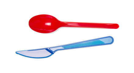 Disposable plastic tableware, spoon and knife, isolated on white